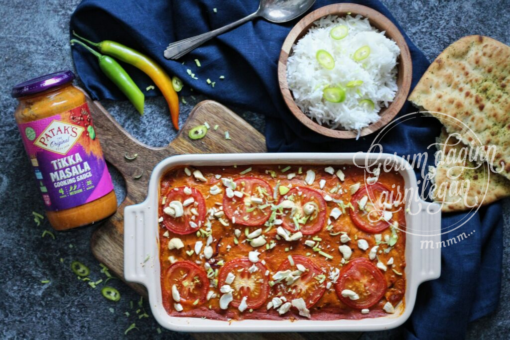 Ofnbökuð Tikka Masala ýsa með rauðlauk og tómötum